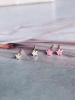 mini star pair rose gold studs