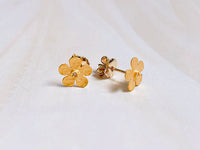 hammered gold and diamond flower earring